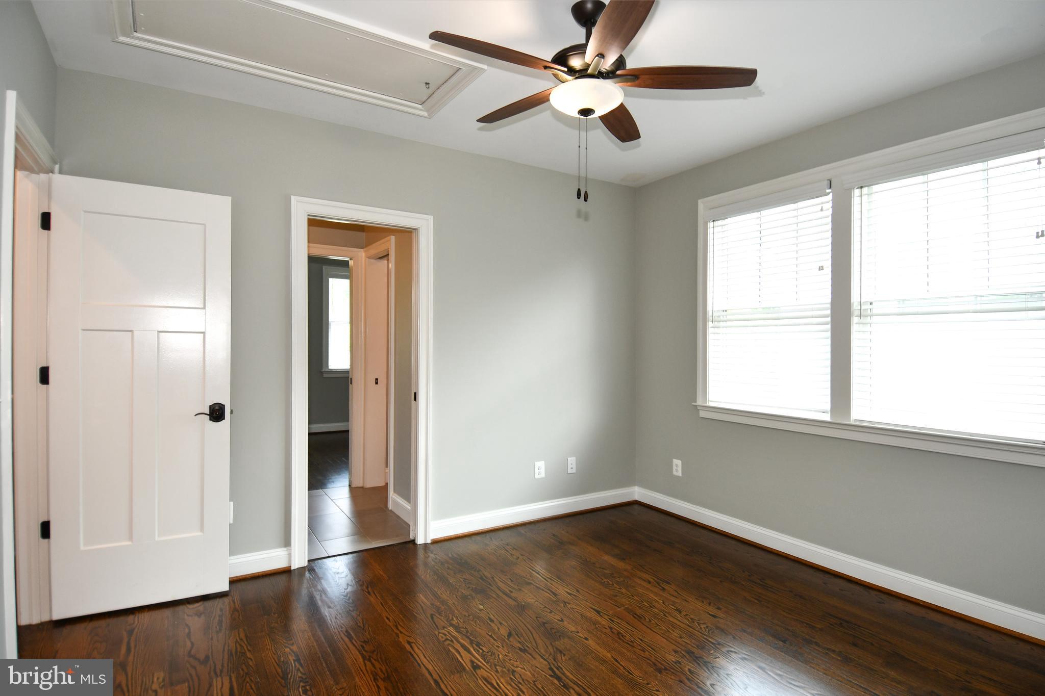497 North Abingdon Street Arlington, VA 22203 - Photo 27 of 64 a view of empty room with wooden floor and fan