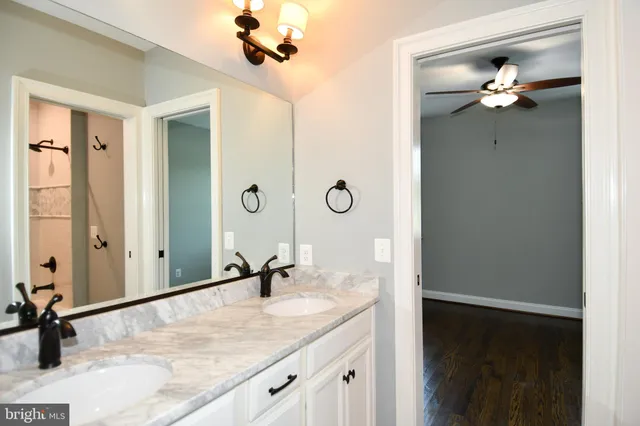 a bathroom with a bathtub and a toilet