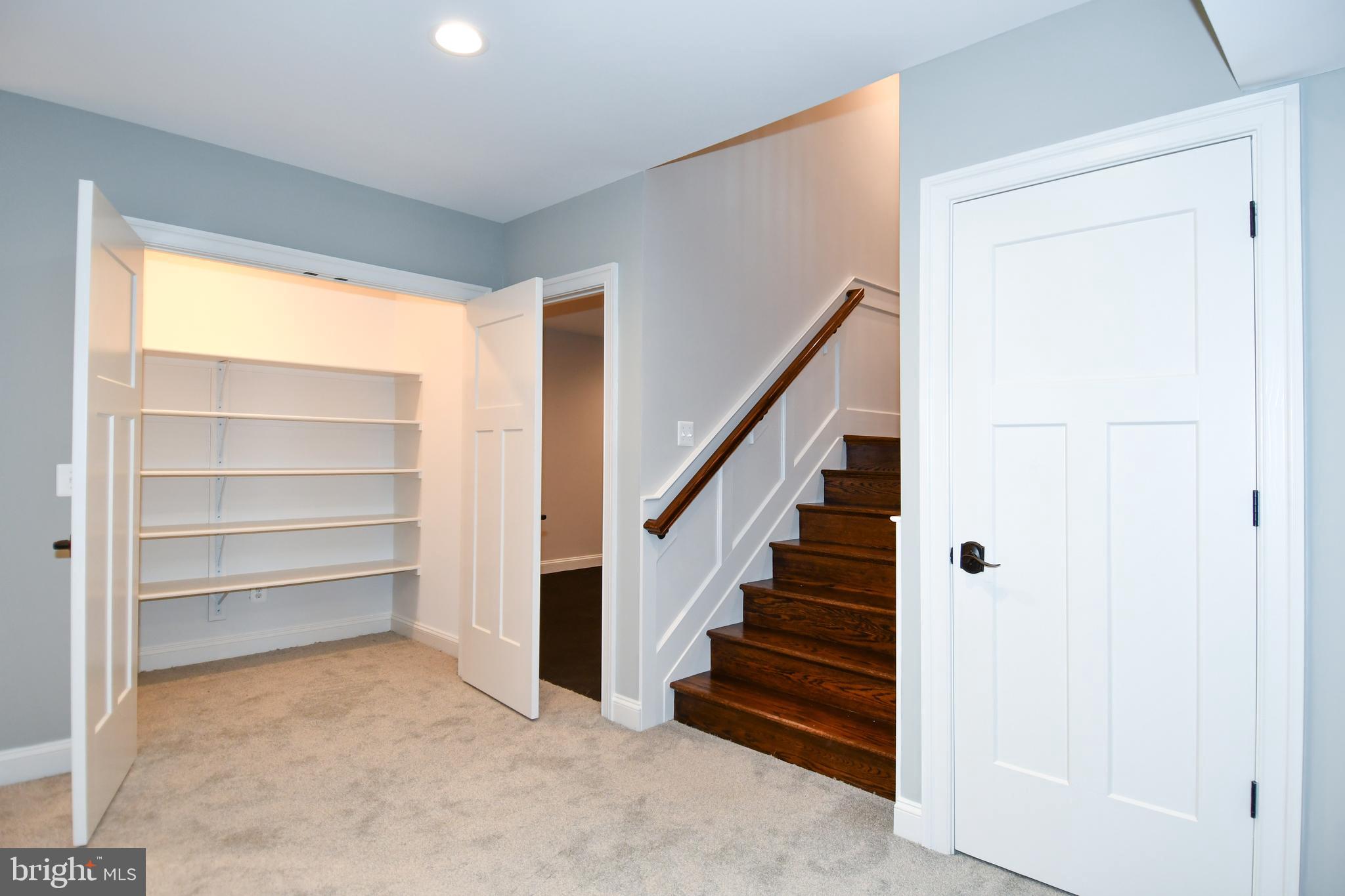 497 North Abingdon Street Arlington, VA 22203 - Photo 38 of 64 a view of entryway with wooden floor and stairs