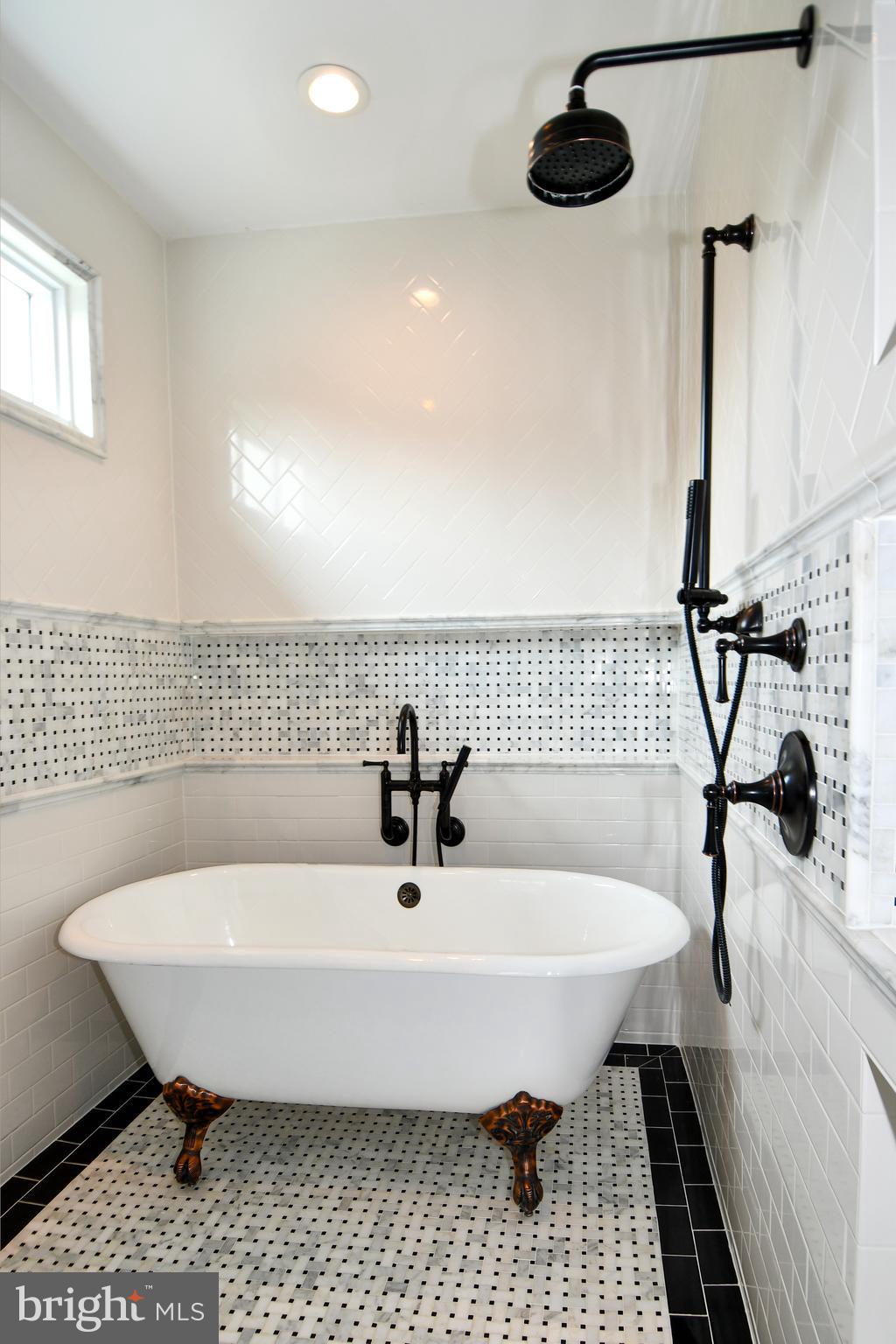 497 North Abingdon Street Arlington, VA 22203 - Photo 51 of 64 a bathroom with a sink and a mirror