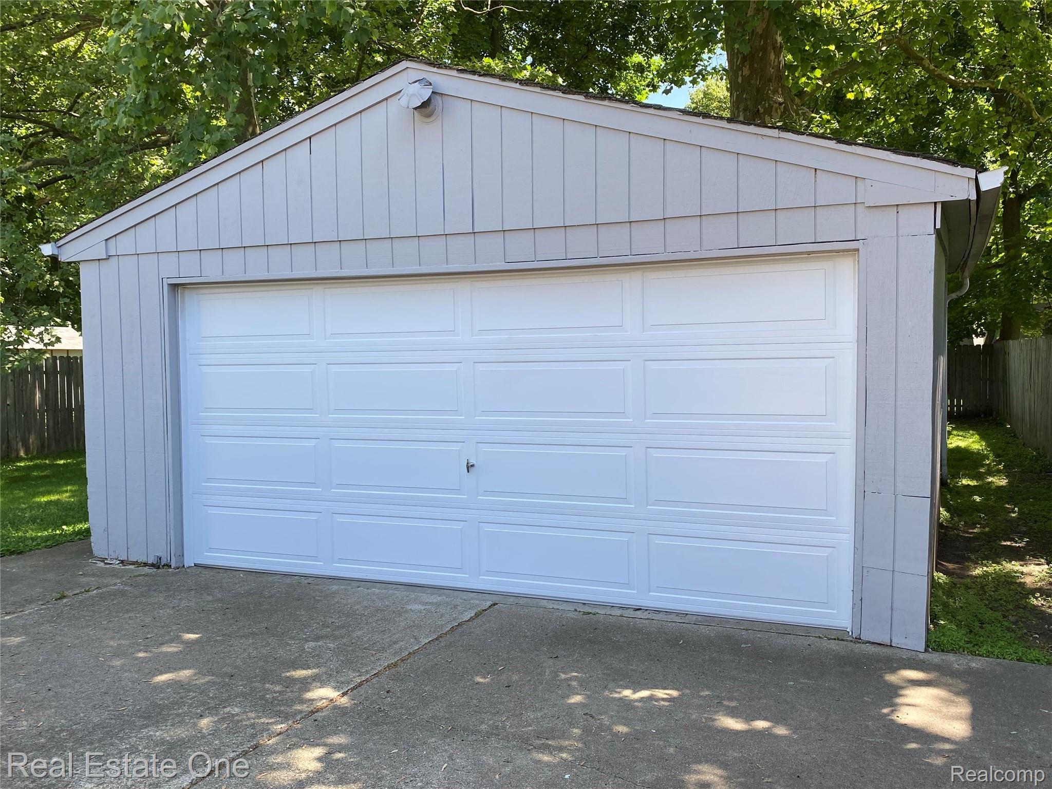 6625 Hatchery Road Waterford, MI 48327 - Photo 16 of 16 2 car garage with brand new door!