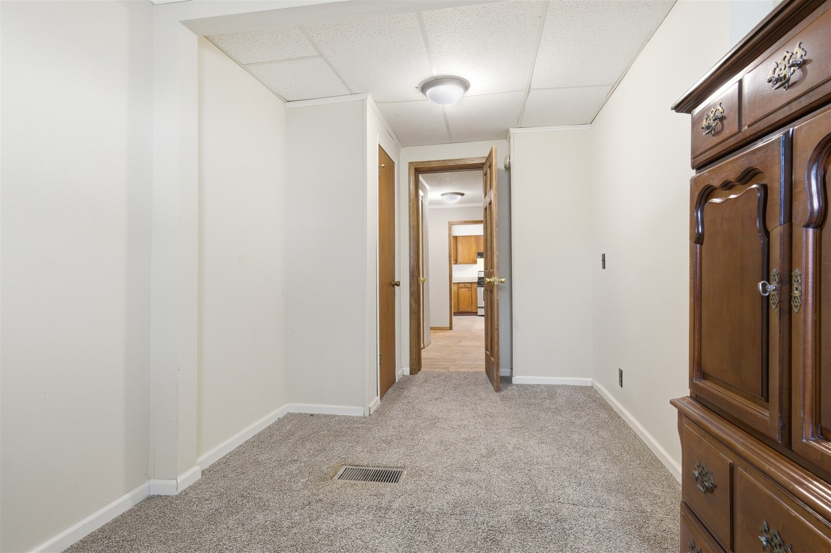 603 West Chestnut Street Bloomington, IL 61701 - Photo 19 of 24 a view of a hallway with a kitchen