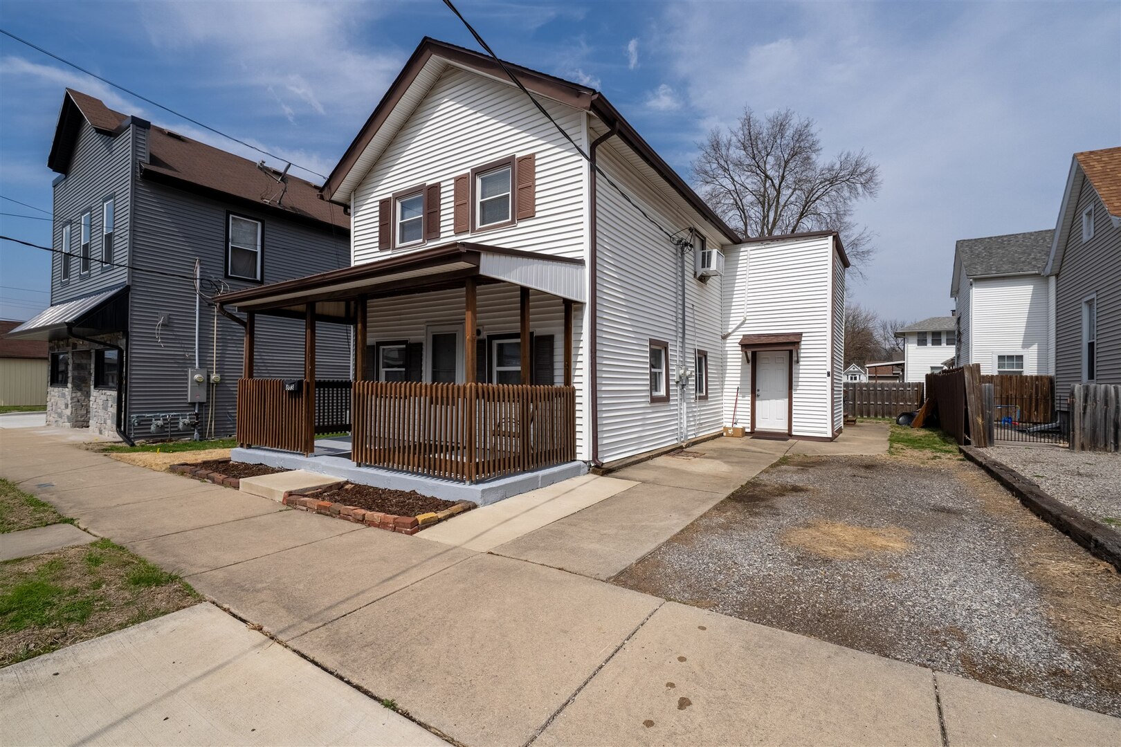 603 West Chestnut Street Bloomington, IL 61701 - Photo 23 of 24 a front view of a house with garden and plants