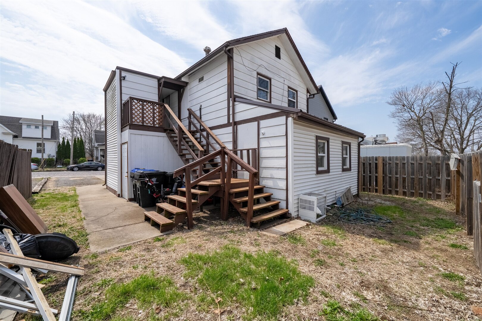 603 West Chestnut Street Bloomington, IL 61701 - Photo 24 of 24 a backyard of a house with wooden fence and trees