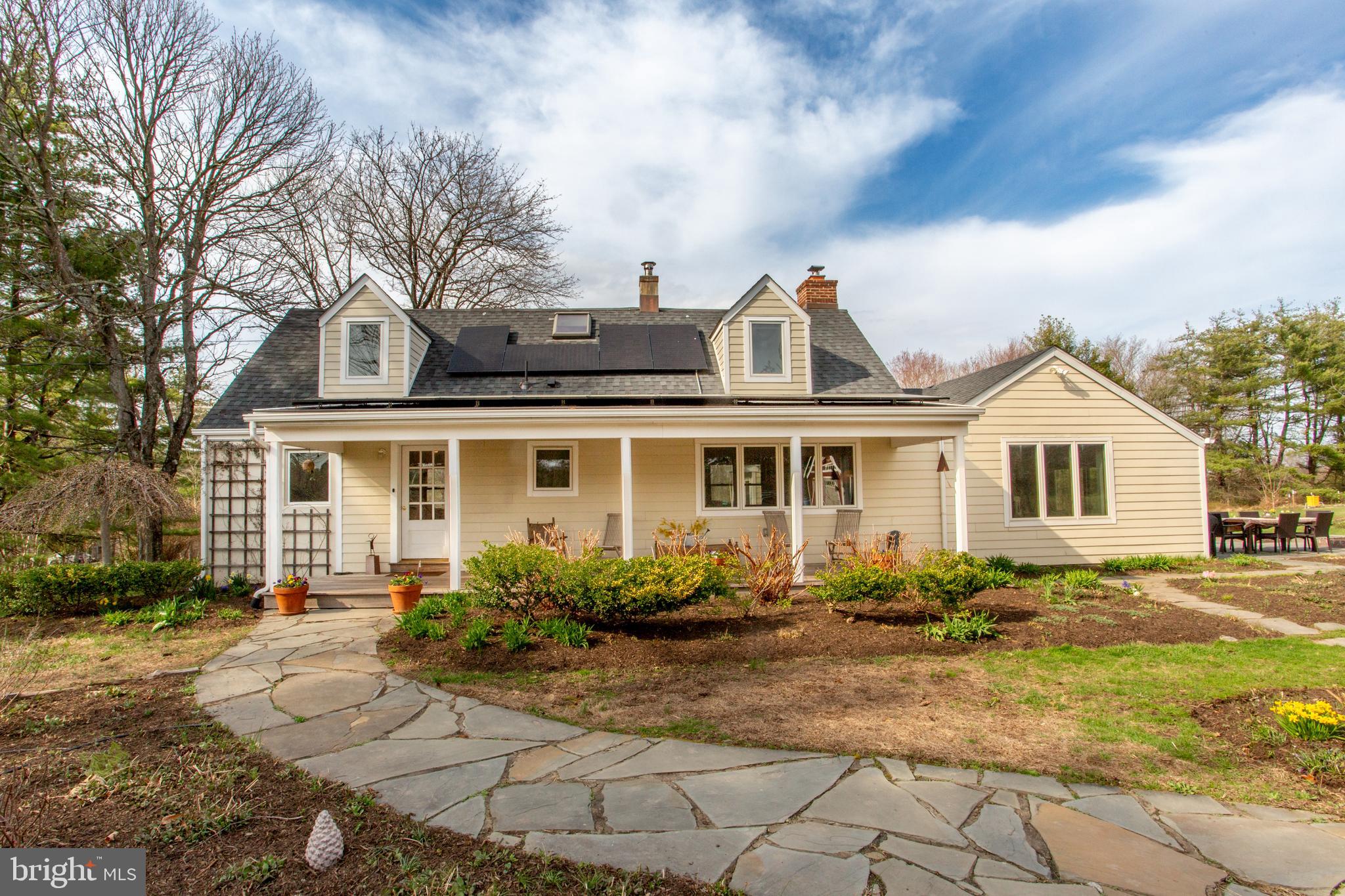 1714-linvale-harbourton R Linvale Harbourton Road Hopewell, NJ 08525 - Photo 40 of 46 a front view of a house with garden