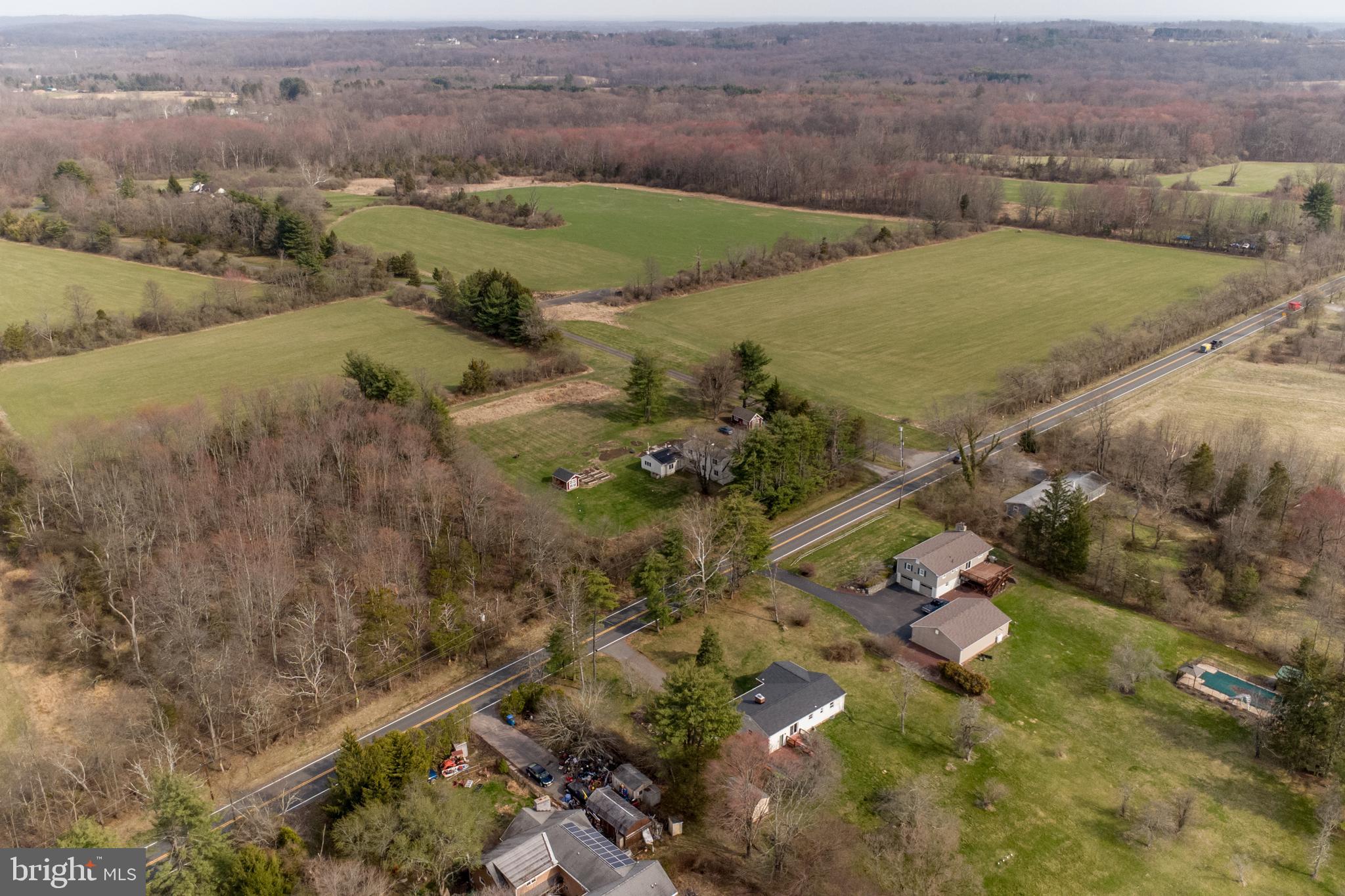 1714-linvale-harbourton R Linvale Harbourton Road Hopewell, NJ 08525 - Photo 44 of 46 an aerial view of a houses with a yard