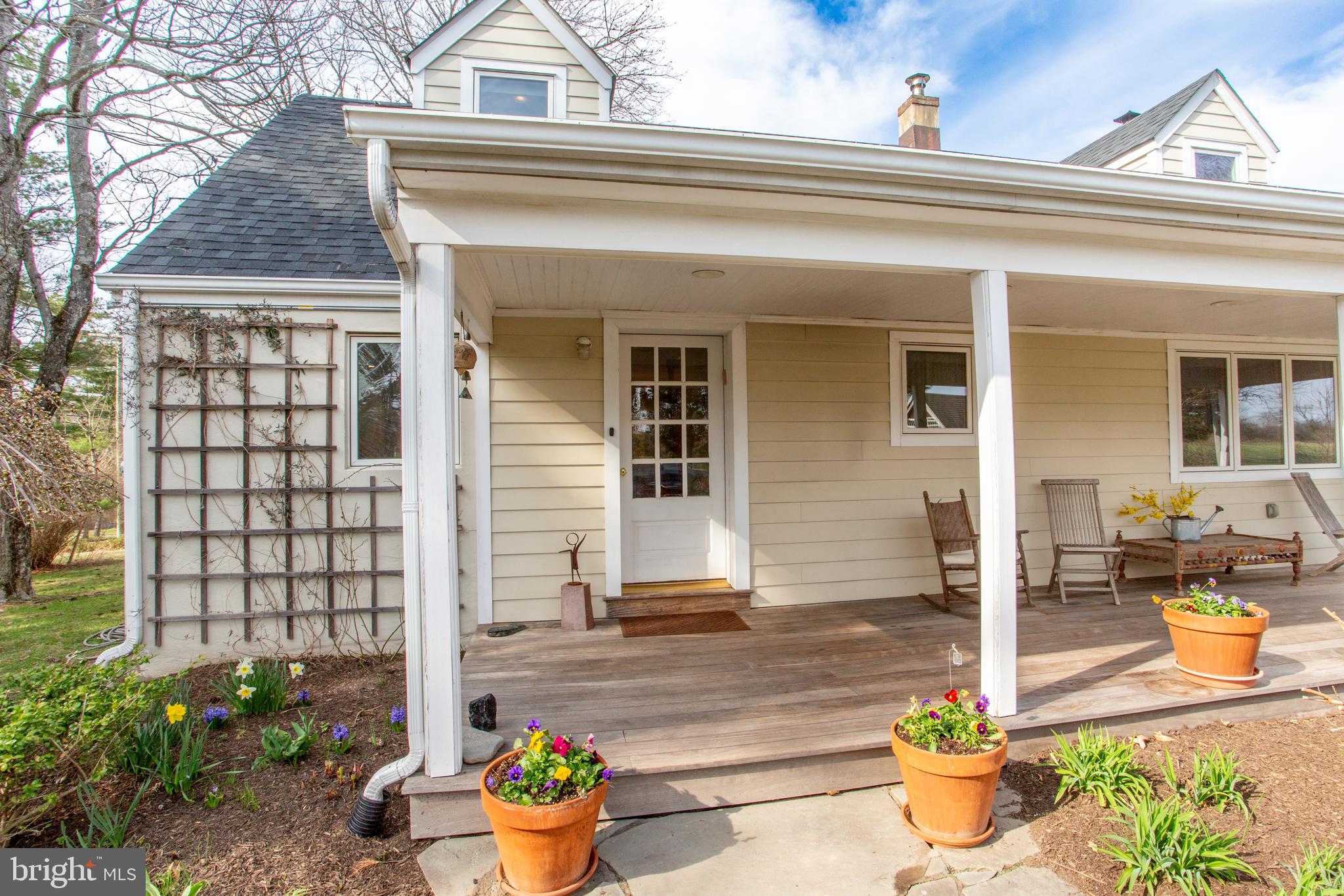 1714-linvale-harbourton R Linvale Harbourton Road Hopewell, NJ 08525 - Photo 8 of 46 a front view of a house with sitting area