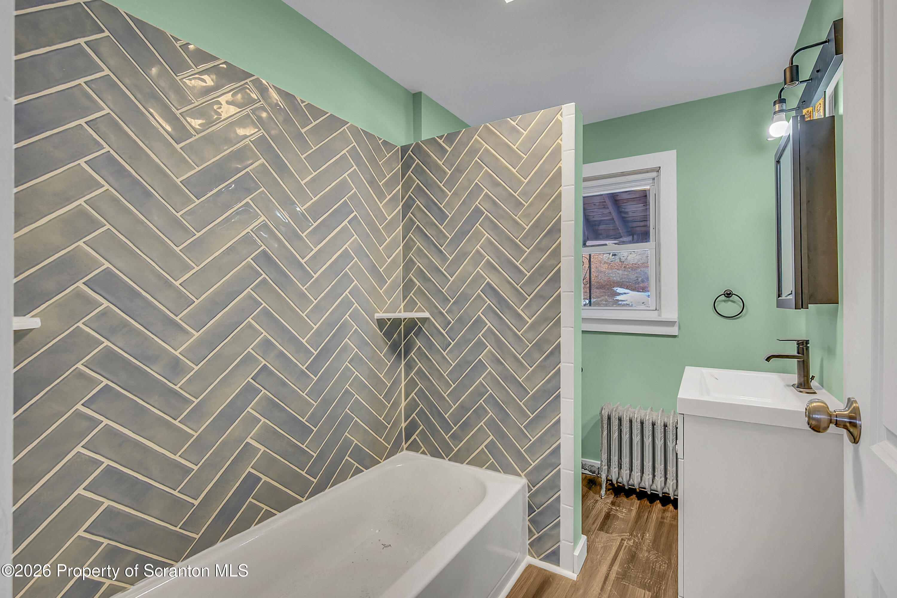 2309 Ash Street Scranton, PA 18510 - Photo 13 of 46 a bathroom with a sink toilet and shower