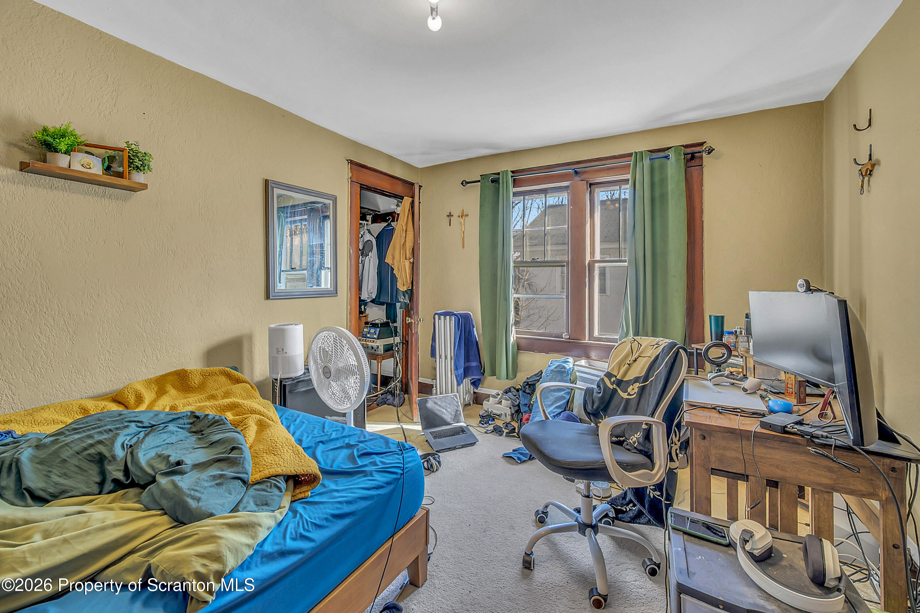 2309 Ash Street Scranton, PA 18510 - Photo 28 of 46 a living room with furniture and floor to ceiling window