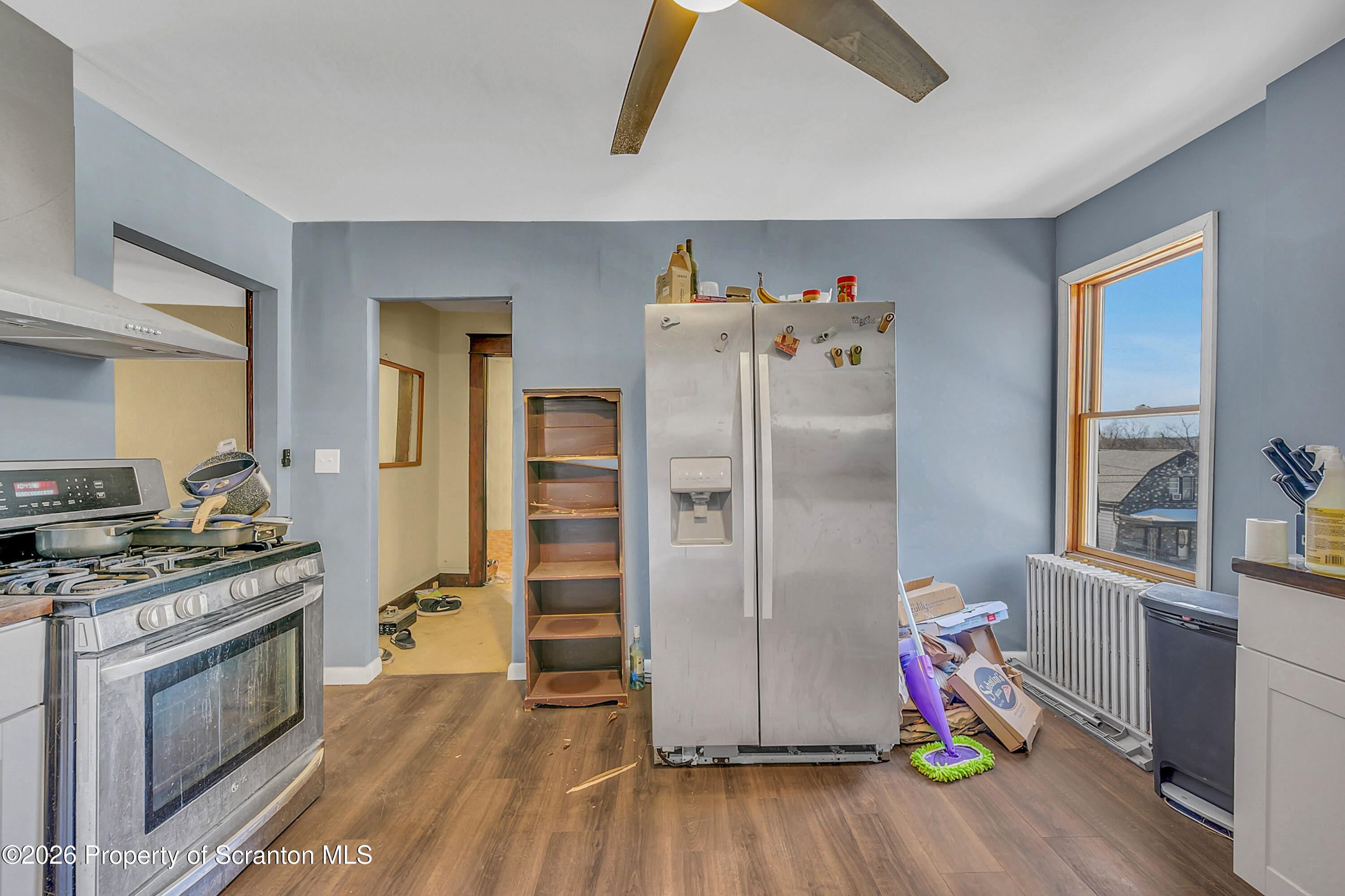 2309 Ash Street Scranton, PA 18510 - Photo 32 of 46 a kitchen with stainless steel appliances a stove and a refrigerator