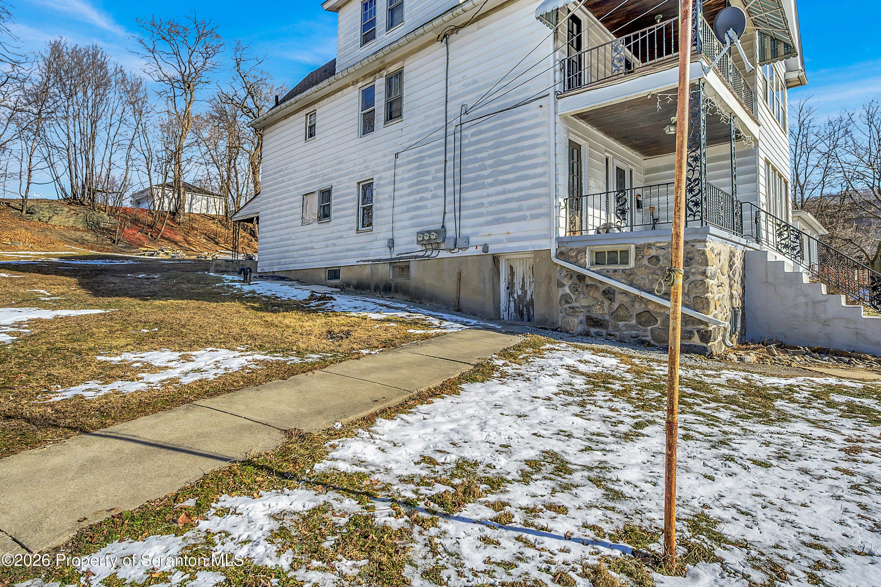 2309 Ash Street Scranton, PA 18510 - Photo 42 of 46 a view of a house with snow on the road