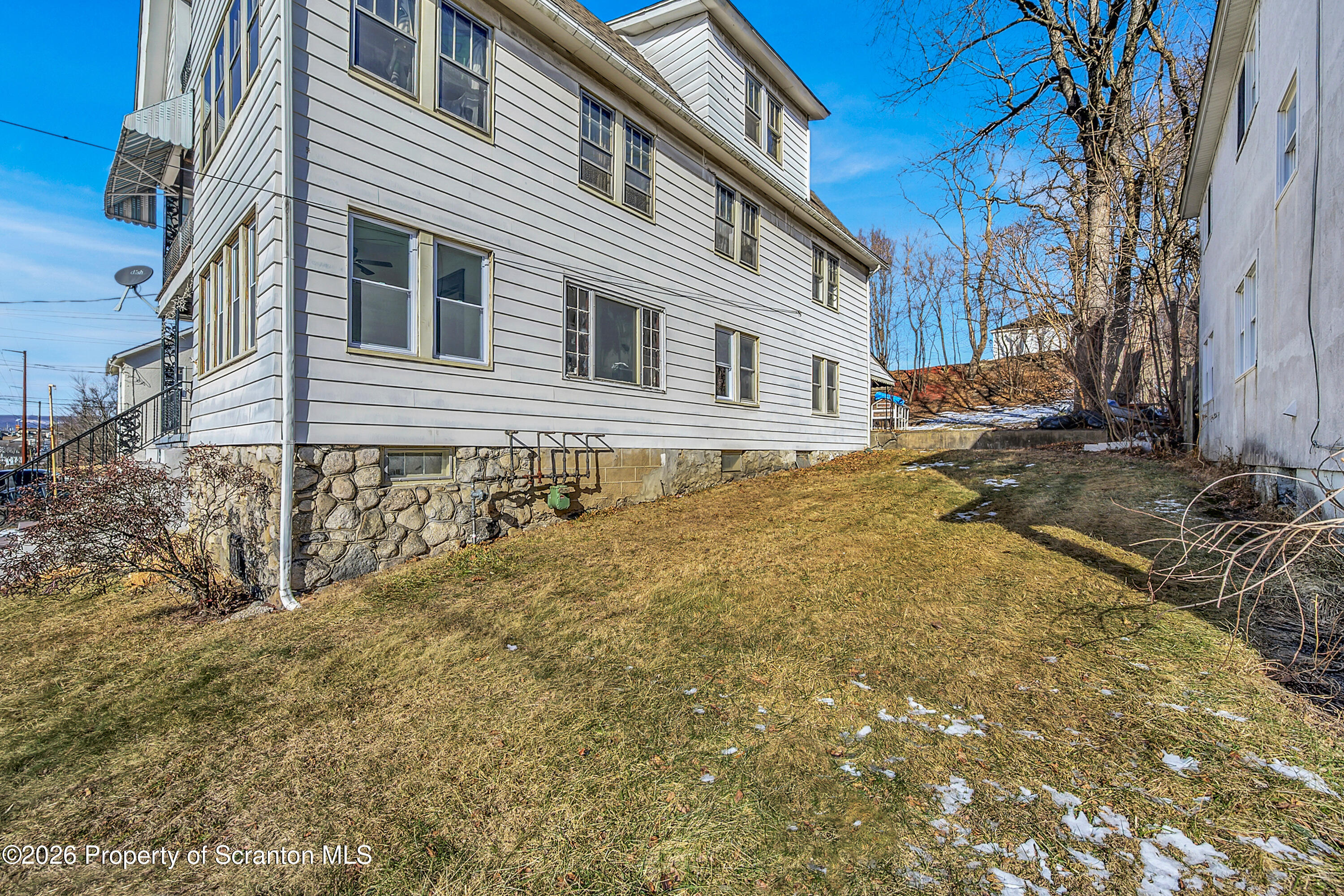 2309 Ash Street Scranton, PA 18510 - Photo 44 of 46 a view of a house with a yard