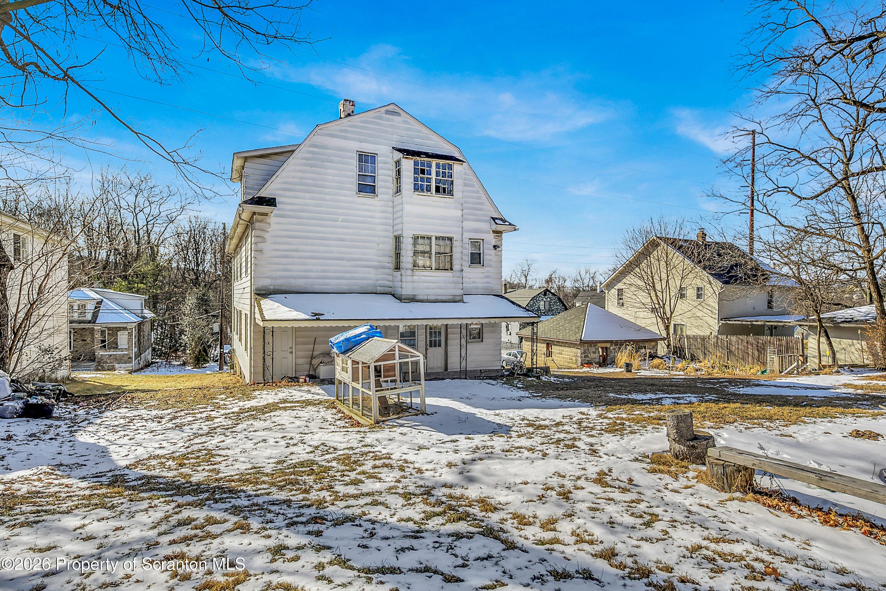 2309 Ash Street Scranton, PA 18510 - Photo 45 of 46 a front view of a house with a yard