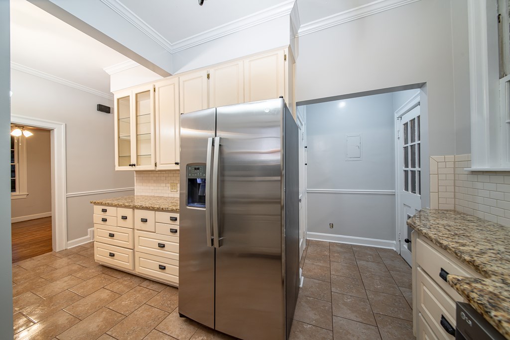 2010 Cherokee Avenue Columbus, GA 31906 - Photo 29 of 54 a kitchen with stainless steel appliances a refrigerator and a stove
