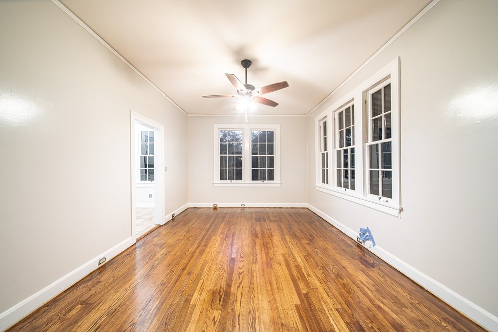 2010 Cherokee Avenue Columbus, GA 31906 - Photo 36 of 54 a view of empty room with wooden floor and fan