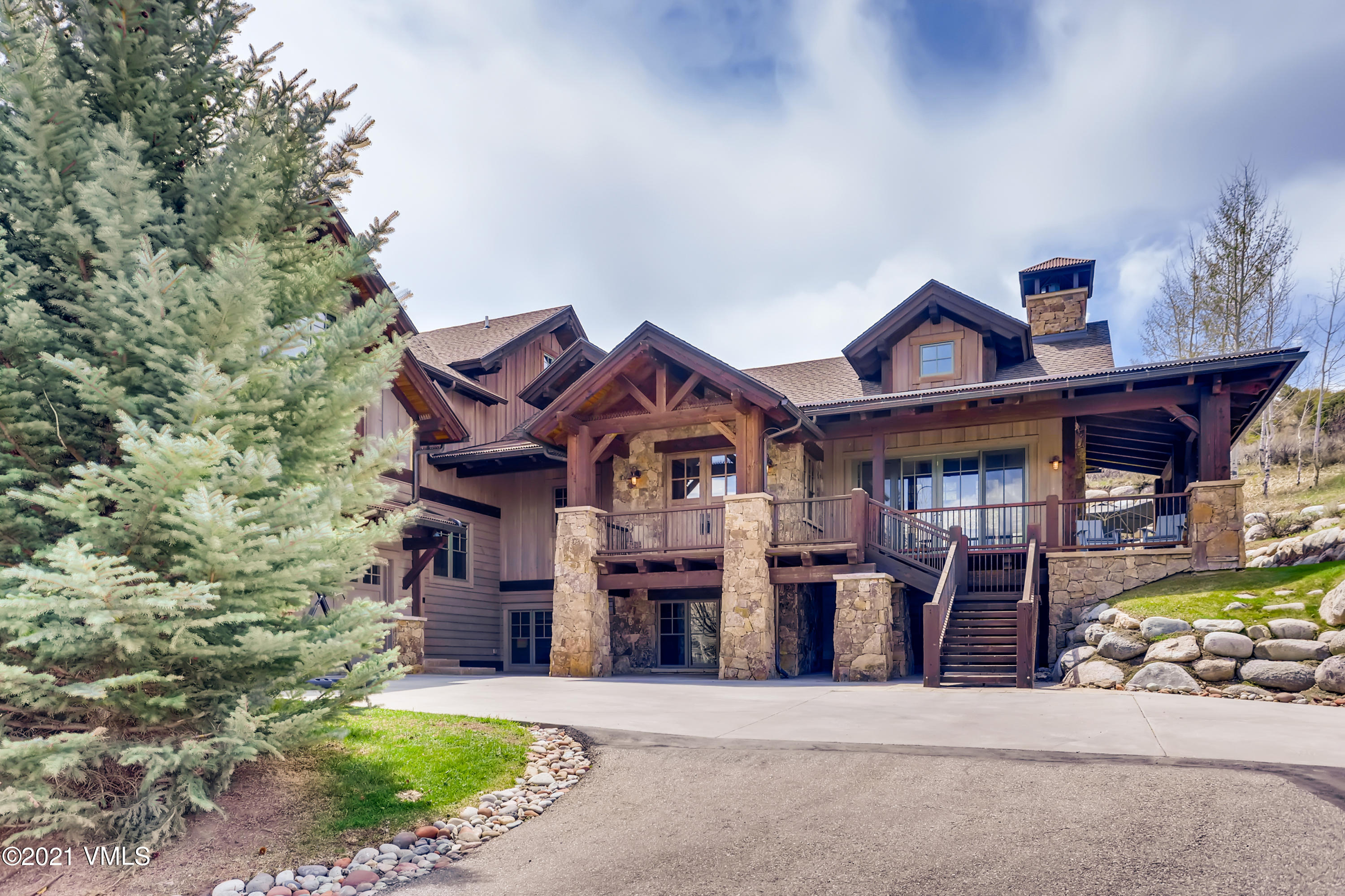 front view of a house with a small yard