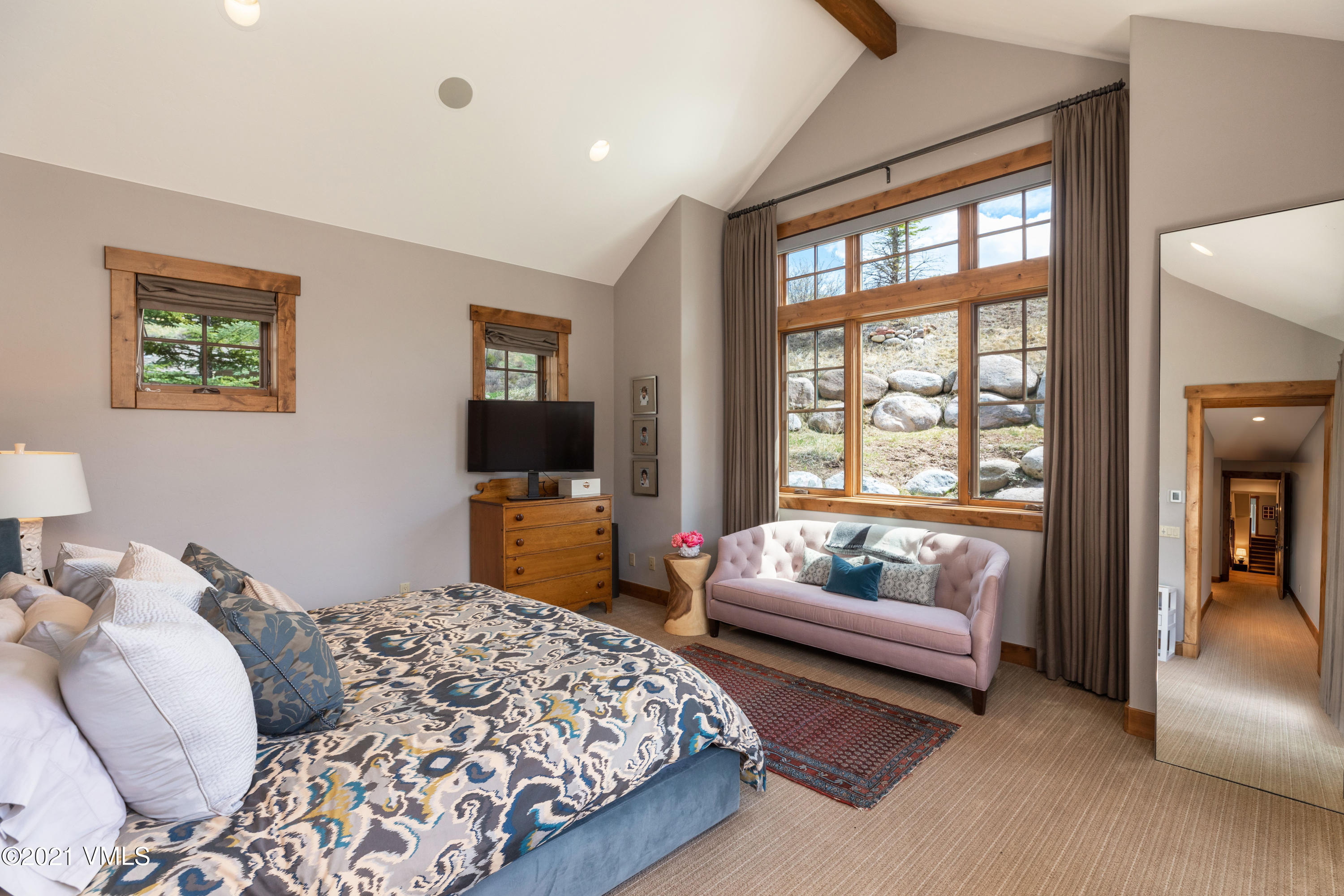 204 Remington Trail Edwards, CO 81632 - Photo 13 of 30 a bedroom with bed couch and window