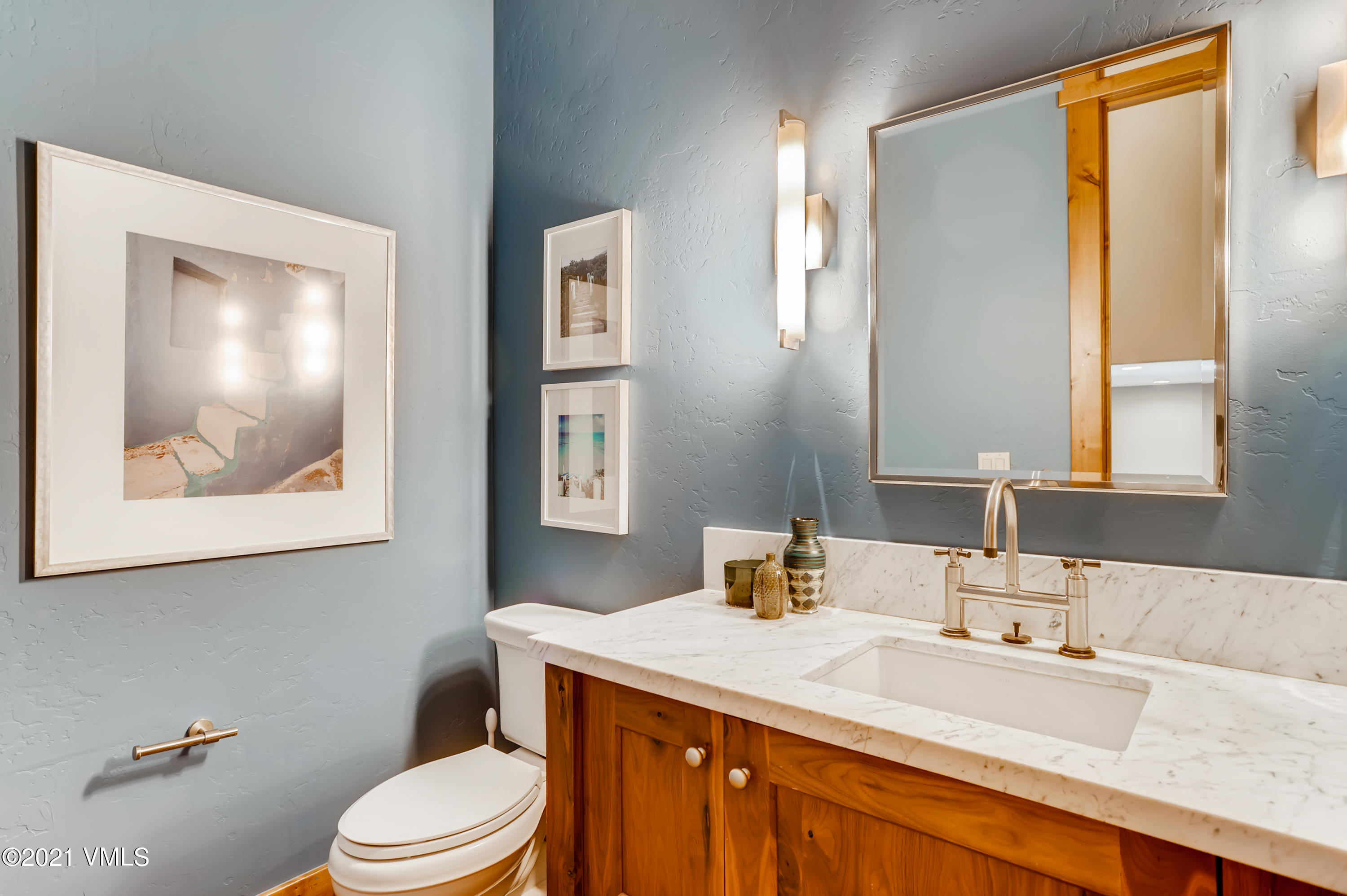 204 Remington Trail Edwards, CO 81632 - Photo 21 of 30 a bathroom with a granite countertop sink mirror vanity and toilet