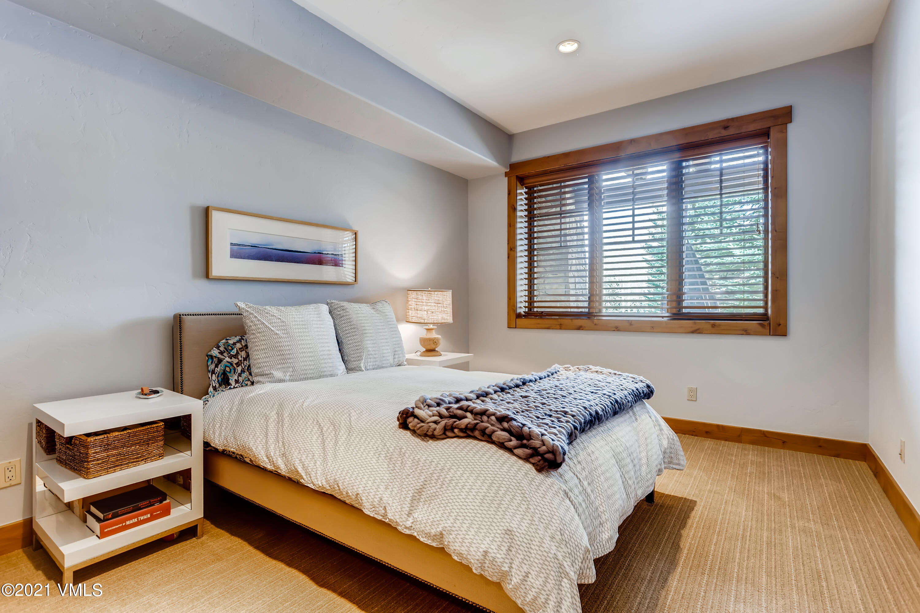 204 Remington Trail Edwards, CO 81632 - Photo 25 of 30 a bedroom with a bed and a window