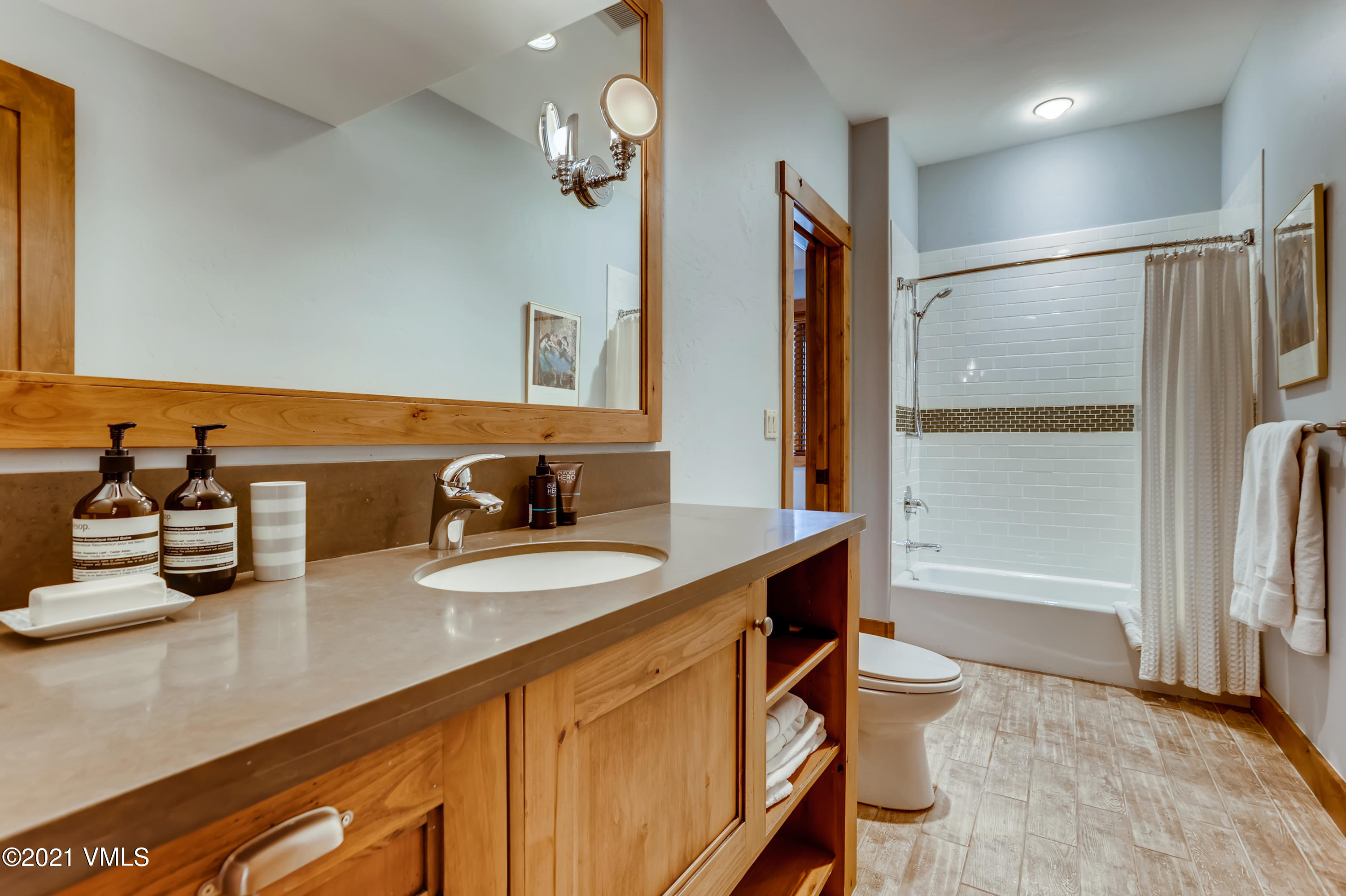 204 Remington Trail Edwards, CO 81632 - Photo 26 of 30 a bathroom with a double vanity sink mirror and toilet