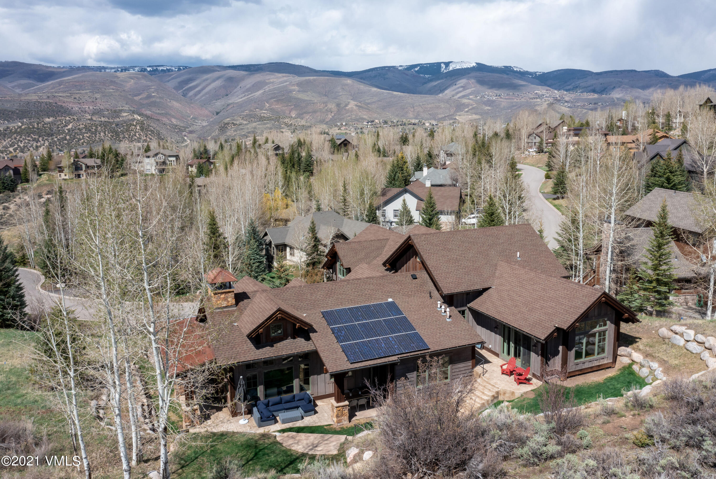 204 Remington Trail Edwards, CO 81632 - Photo 30 of 30 an aerial view of a house with swimming pool and mountain view
