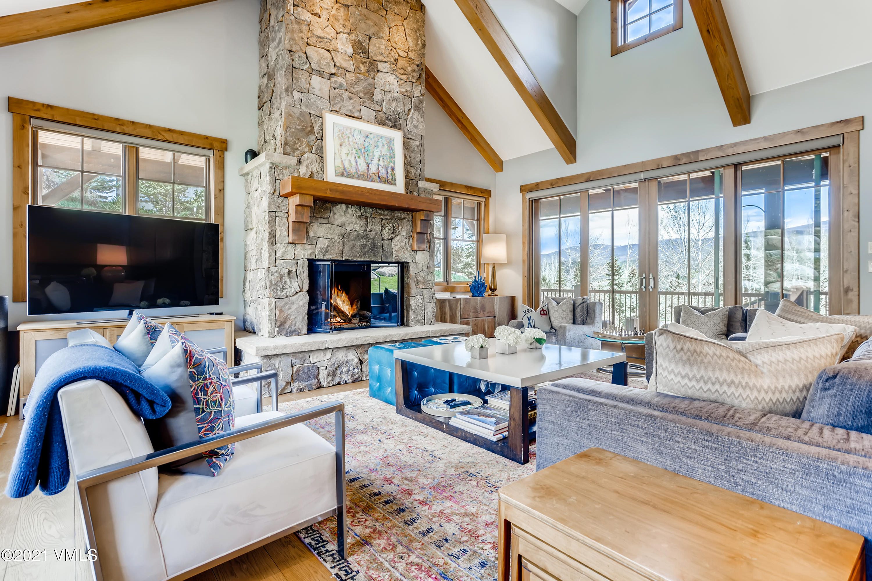 204 Remington Trail Edwards, CO 81632 - Photo 4 of 30 a living room with fireplace furniture and a flat screen tv