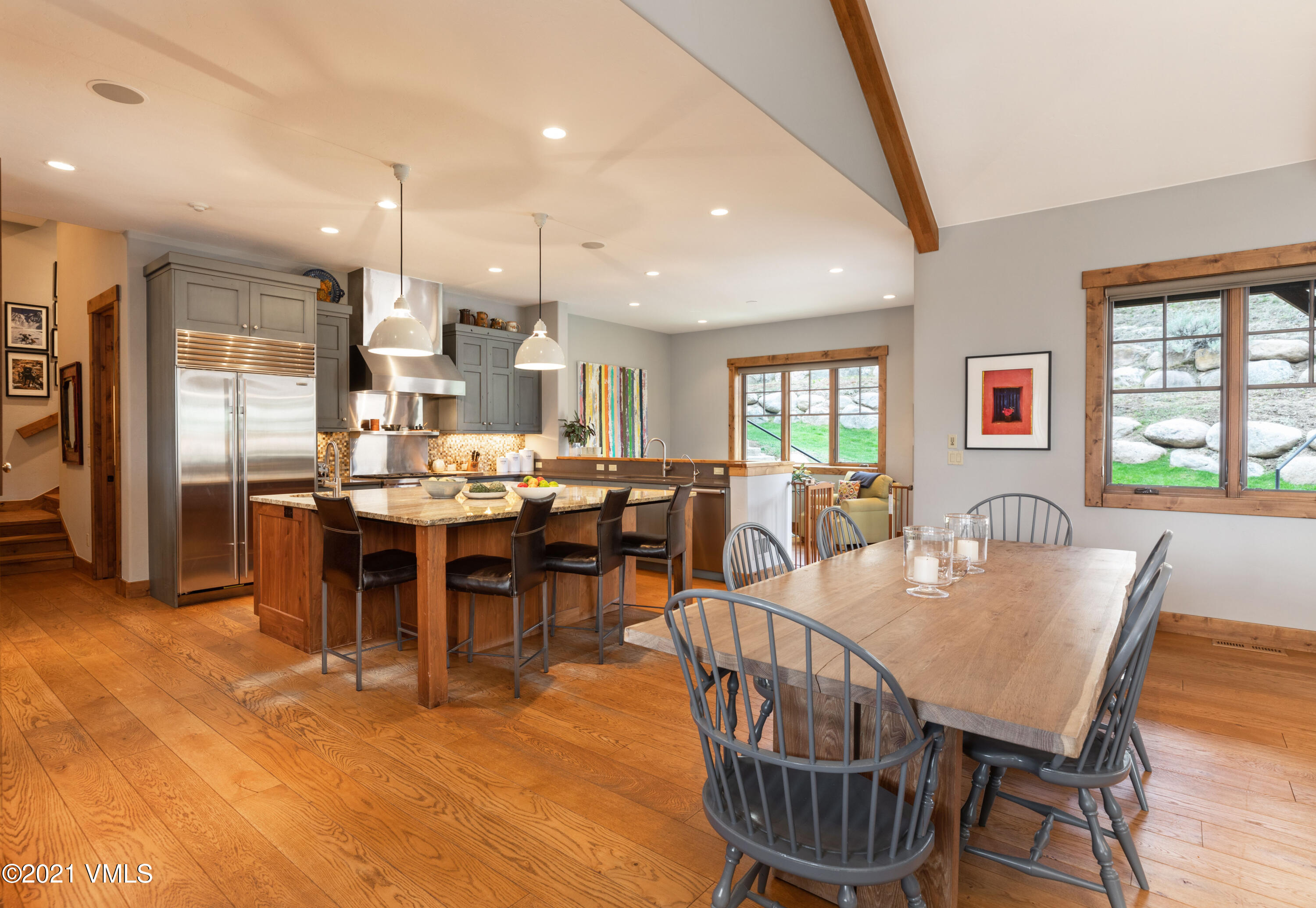 204 Remington Trail Edwards, CO 81632 - Photo 7 of 30 a view of a dining area with furniture window and wooden floor