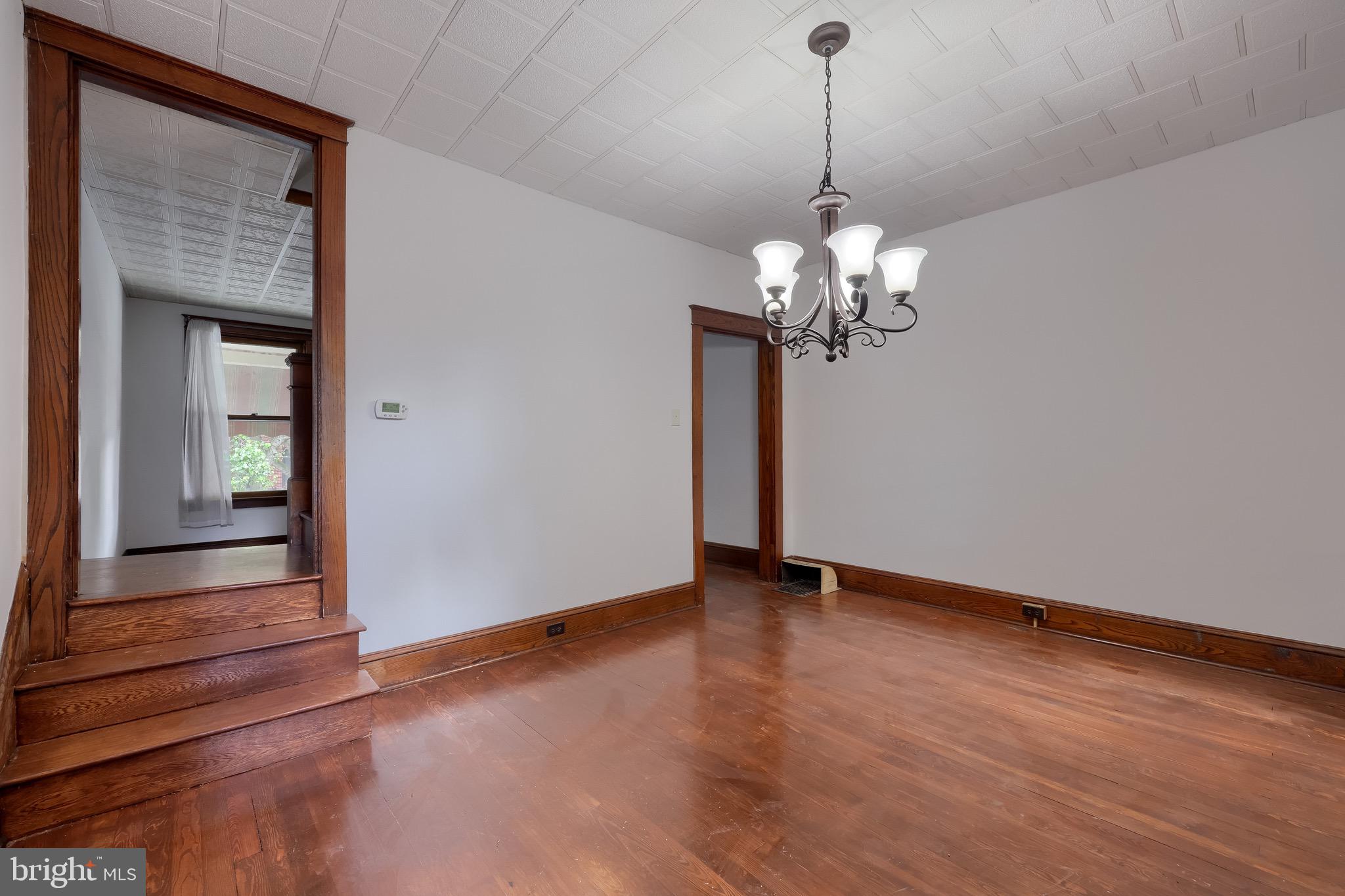 720 1st Street Lancaster, PA 17603 - Photo 20 of 50 a view of a chandelier in big room and empty room