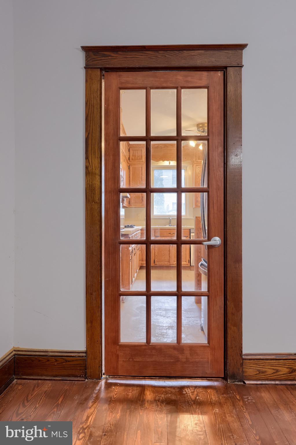 720 1st Street Lancaster, PA 17603 - Photo 24 of 50 a view of an empty room with wooden floor and a window