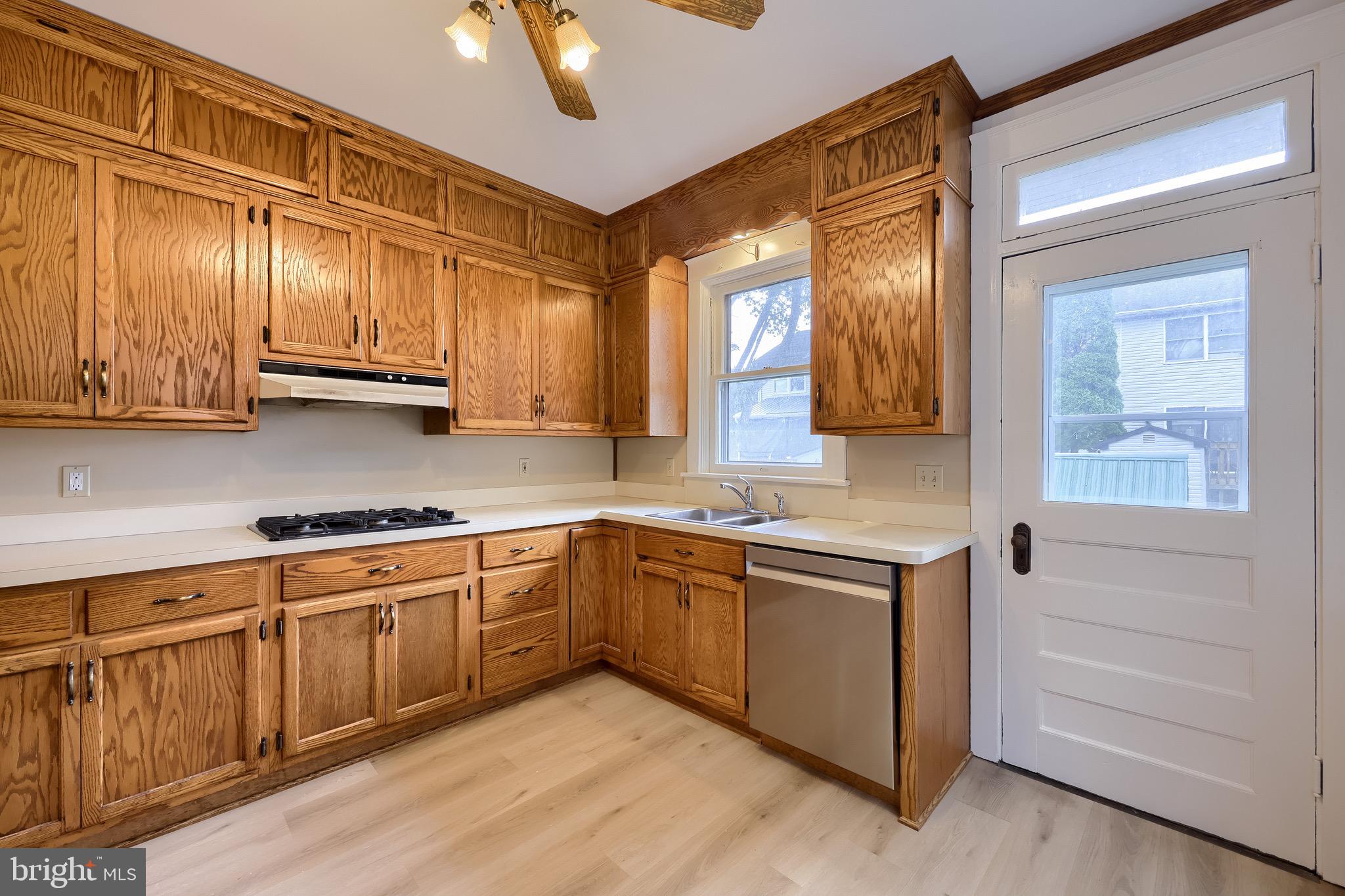 720 1st Street Lancaster, PA 17603 - Photo 29 of 50 a kitchen with stainless steel appliances granite countertop a stove and a sink