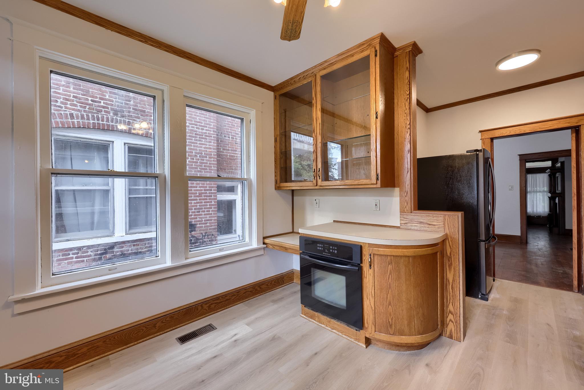720 1st Street Lancaster, PA 17603 - Photo 31 of 50 a view of a kitchen cabinets and a stove top oven