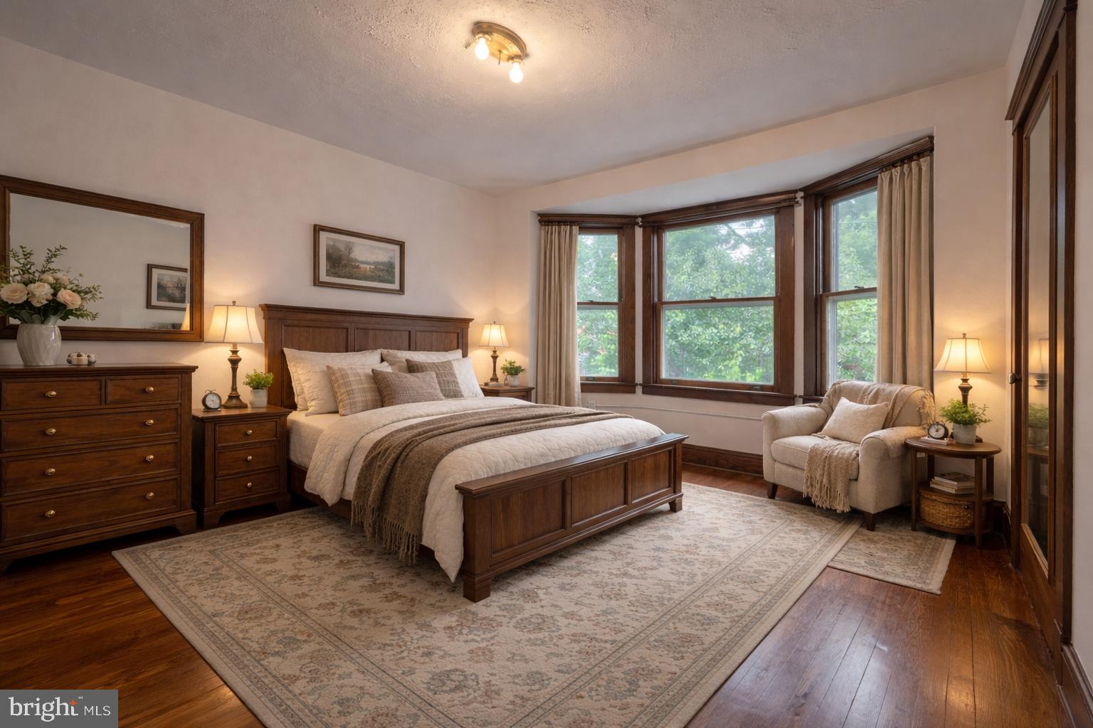 720 1st Street Lancaster, PA 17603 - Photo 36 of 50 a spacious bedroom with a bed and a couch