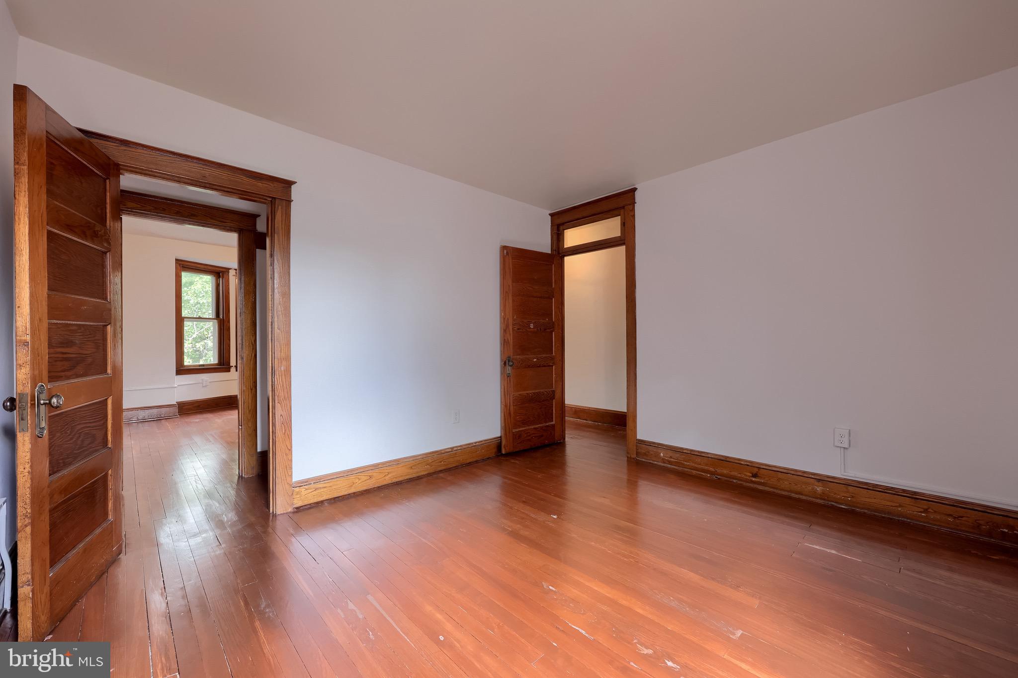 720 1st Street Lancaster, PA 17603 - Photo 38 of 50 an empty room with wooden floor and closet