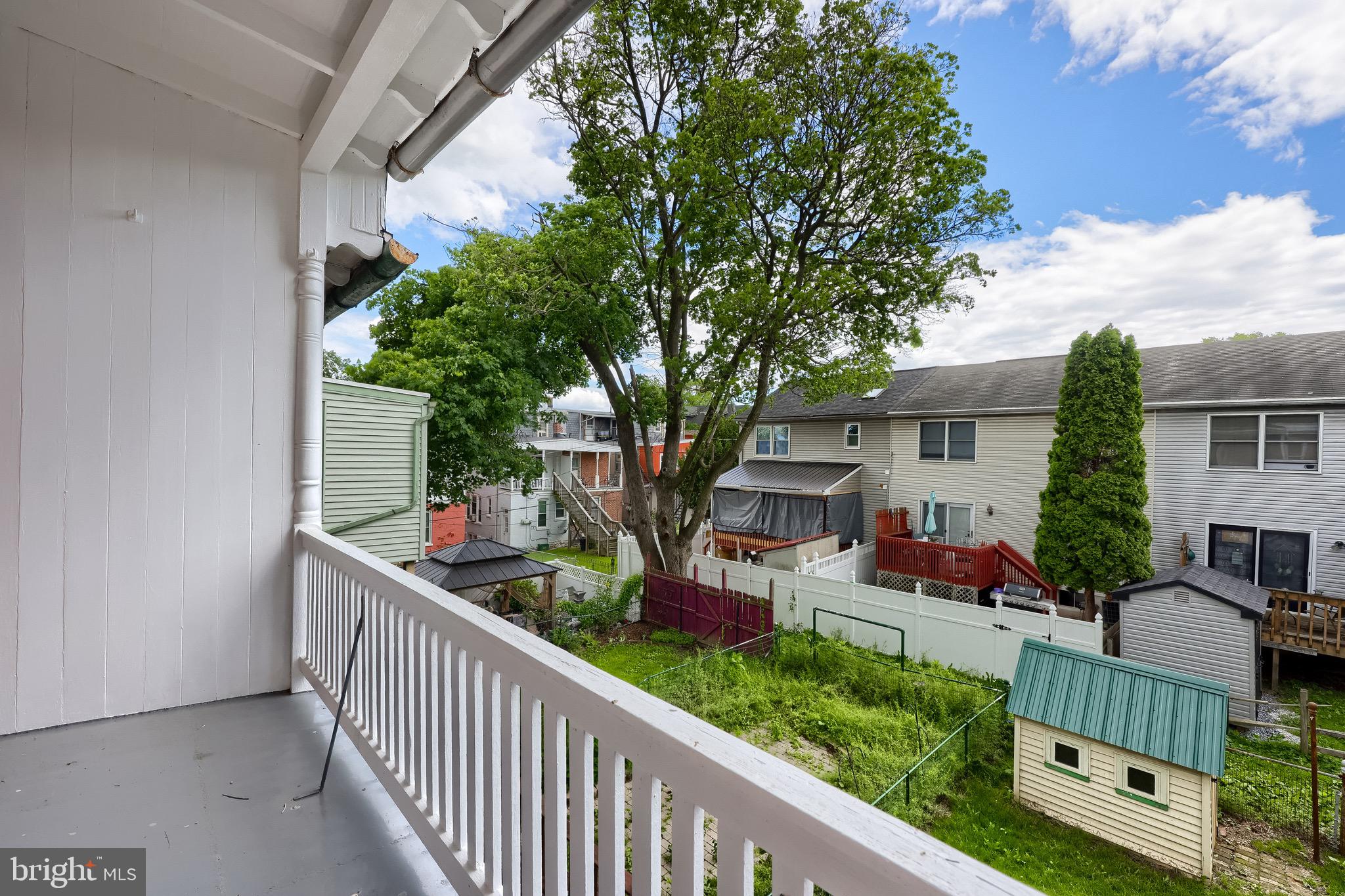 720 1st Street Lancaster, PA 17603 - Photo 45 of 50 a front view of house with yard and green space