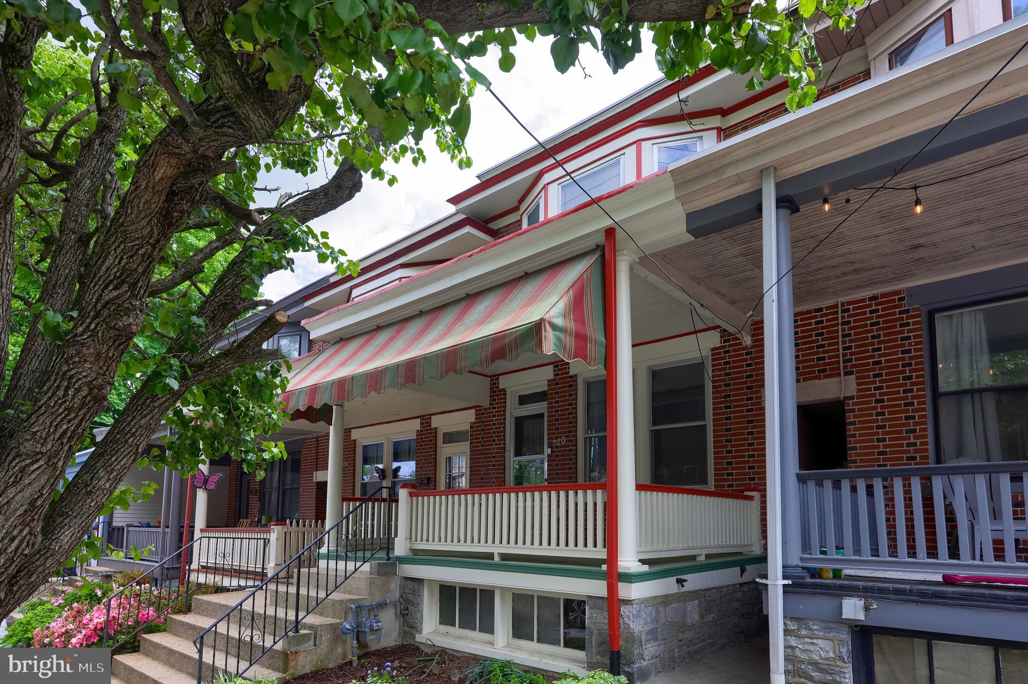 720 1st Street Lancaster, PA 17603 - Photo 6 of 50 a front view of a house with a garden