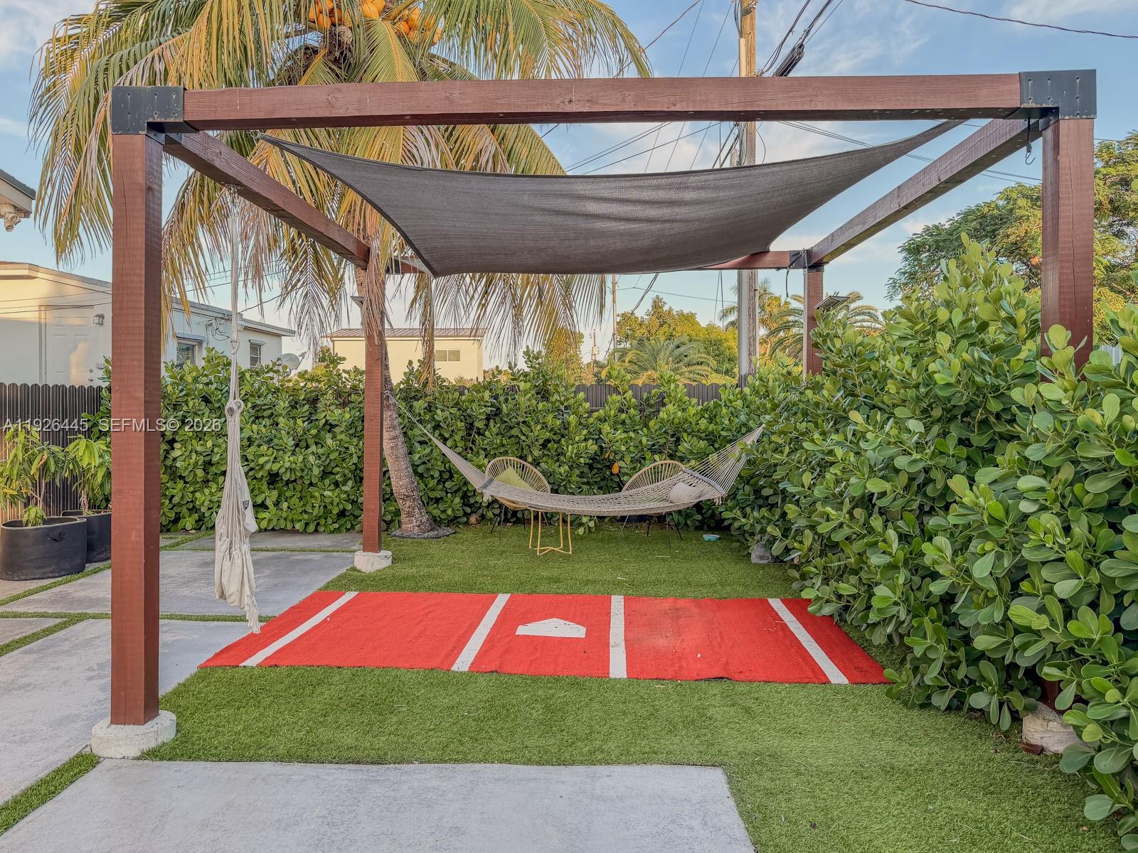 7840 Southwest 18th Terrace Miami, FL 33155 - Photo 20 of 28 a view of backyard with swimming pool and outdoor space