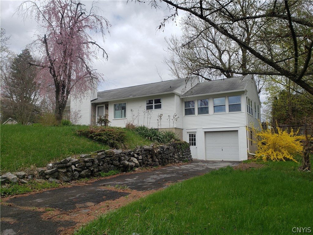 26 Pickwick Road DeWitt, NY 13214 - Photo 1 of 1 view of home from end of driveway, lots of floweri
