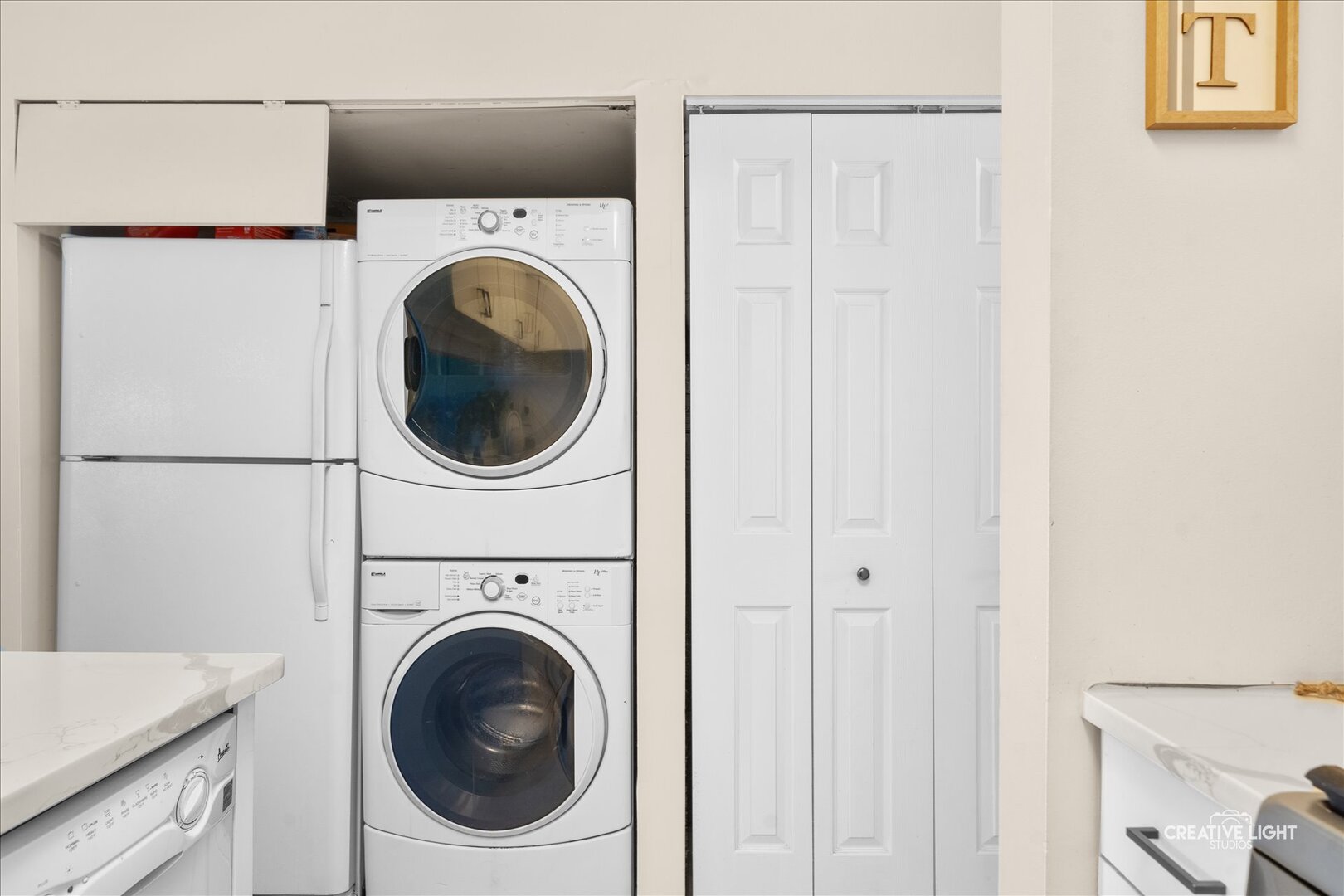 2437 Devonshire Court Aurora, IL 60502 - Photo 9 of 14 a utility room with dryer and washer