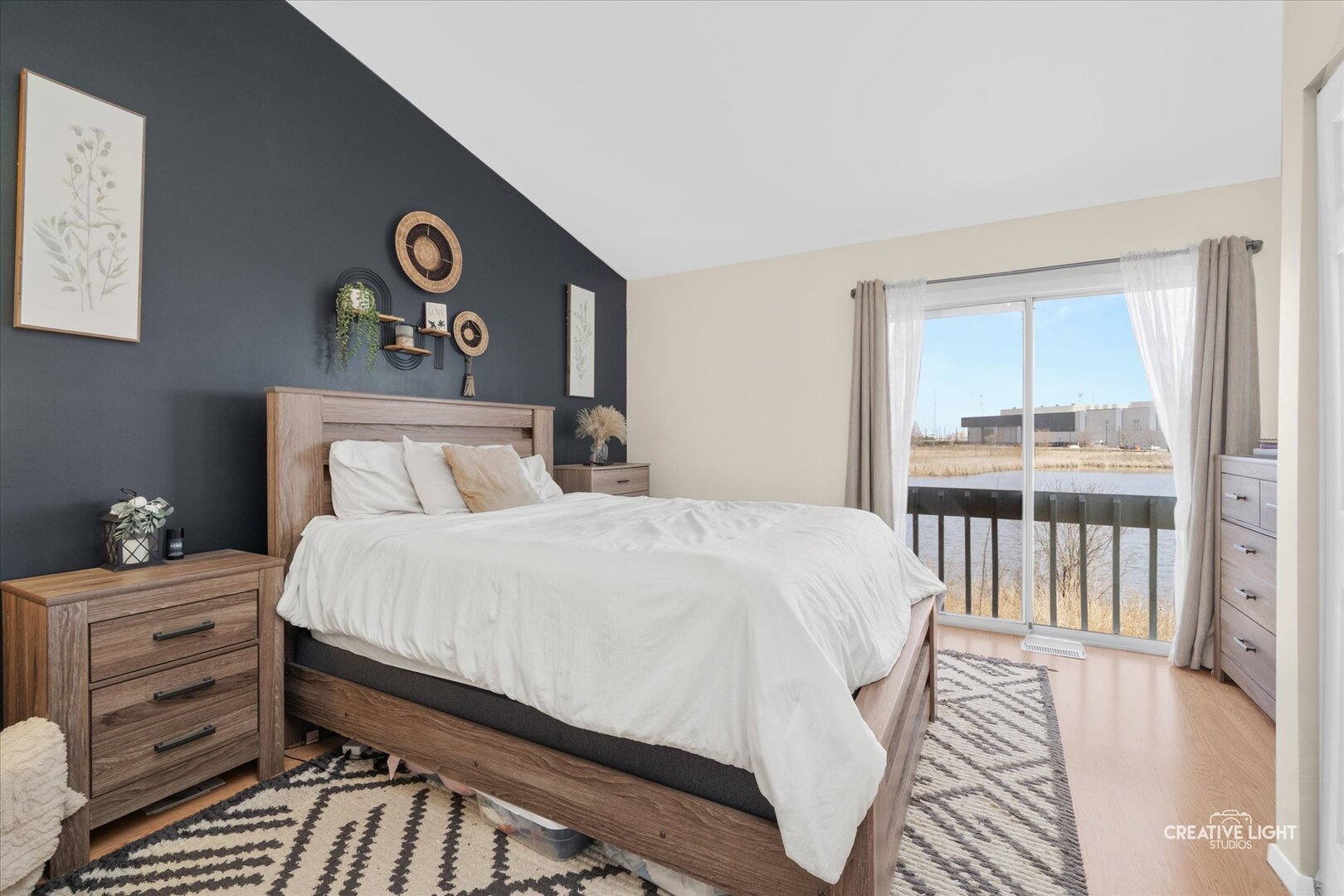 2437 Devonshire Court Aurora, IL 60502 - Photo 10 of 14 a bedroom with a bed and a window