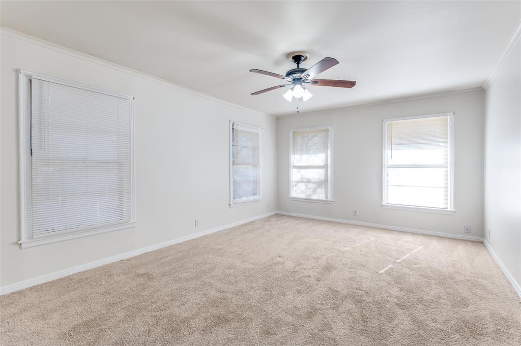 402 West Grauwyler Road Irving, TX 75061 - Photo 16 of 22 a view of an empty room with a window