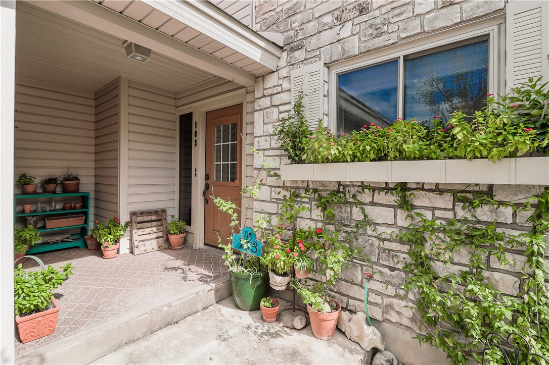 103 Overlook Circle Wimberley, TX 78676 - Photo 1 of 1 a front view of a house with a yard
