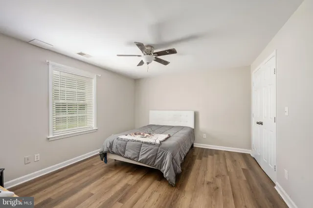 an aerial view of a house with outdoor space swimming pool and lake view