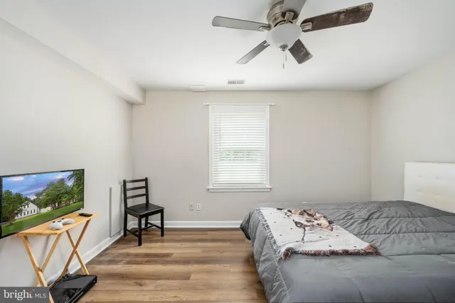 an aerial view of a house with yard