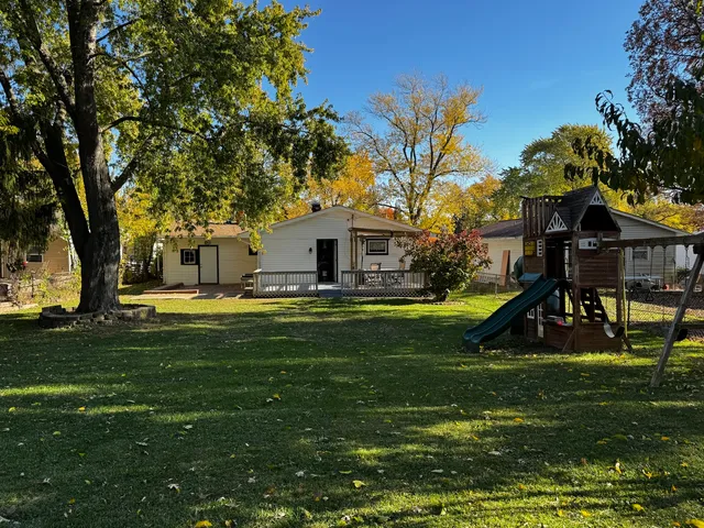 a view of a house with a swimming pool