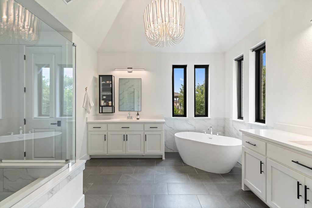 2324 High Lonesome Leander, TX 78641 - Photo 19 of 40 The primary bath is pure indulgence.