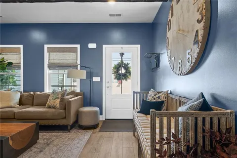 a living room with furniture and a window
