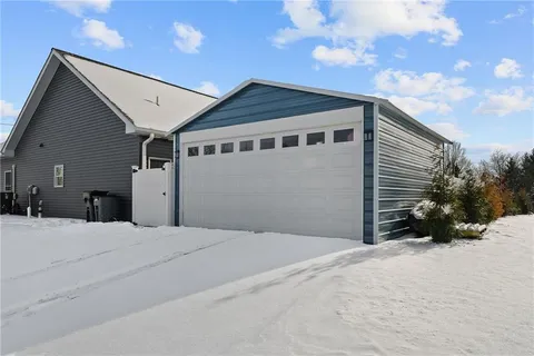 a view of a livingroom with furniture and a fireplace