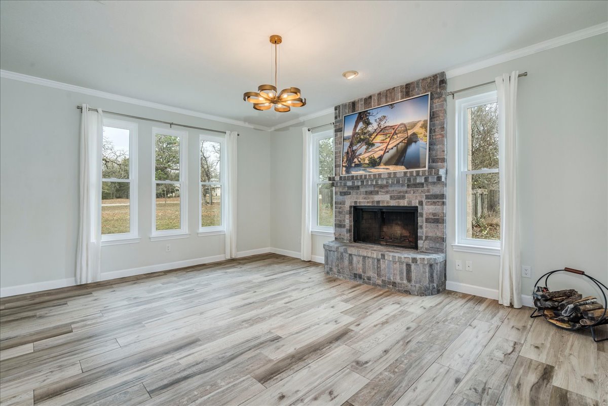 171 Pin Oak Crossing Elgin, TX 78621 - Photo 8 of 39 Unfurnished living Room