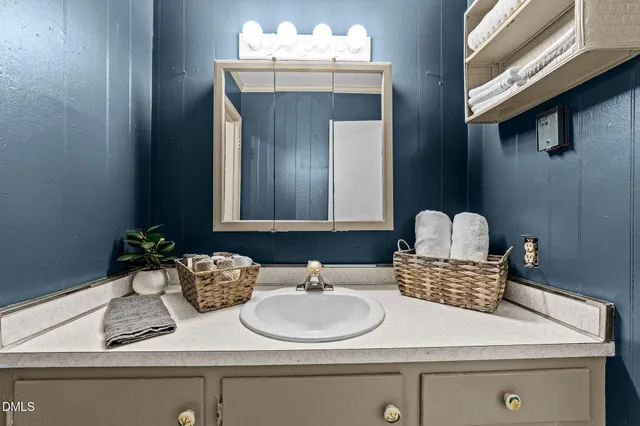 a bathroom with a toilet sink and tub