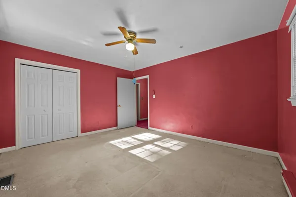 a view of a big room with carpet